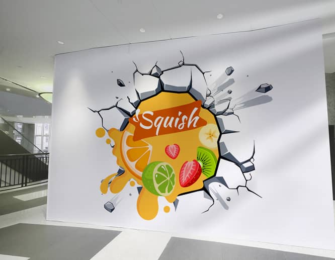 Colorful wall decal with fruit icons and a company name in a 3D effect