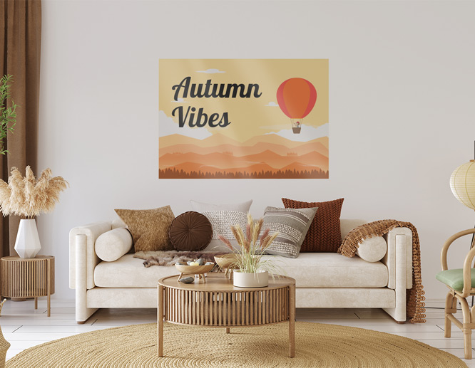 Autumn themed living room removable wall decal adhered above the sofa