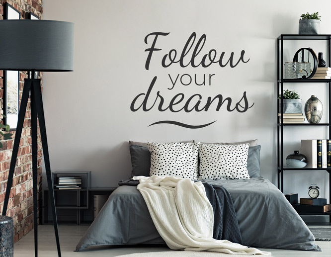 Inspirational bedroom vinyl wall saying in black above the bed