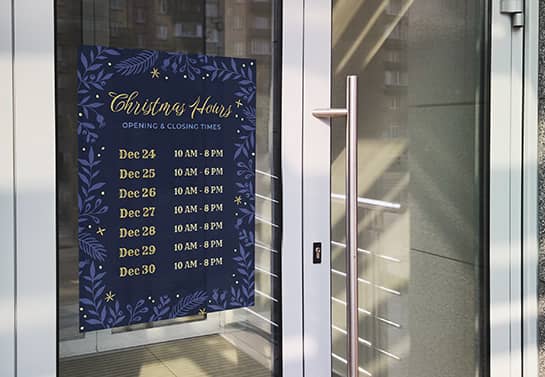 Christmas hours sign displaying opening and closing times on a purple background