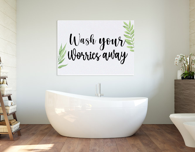 Custom wall art quote with floral design elements attached to bathroom wall