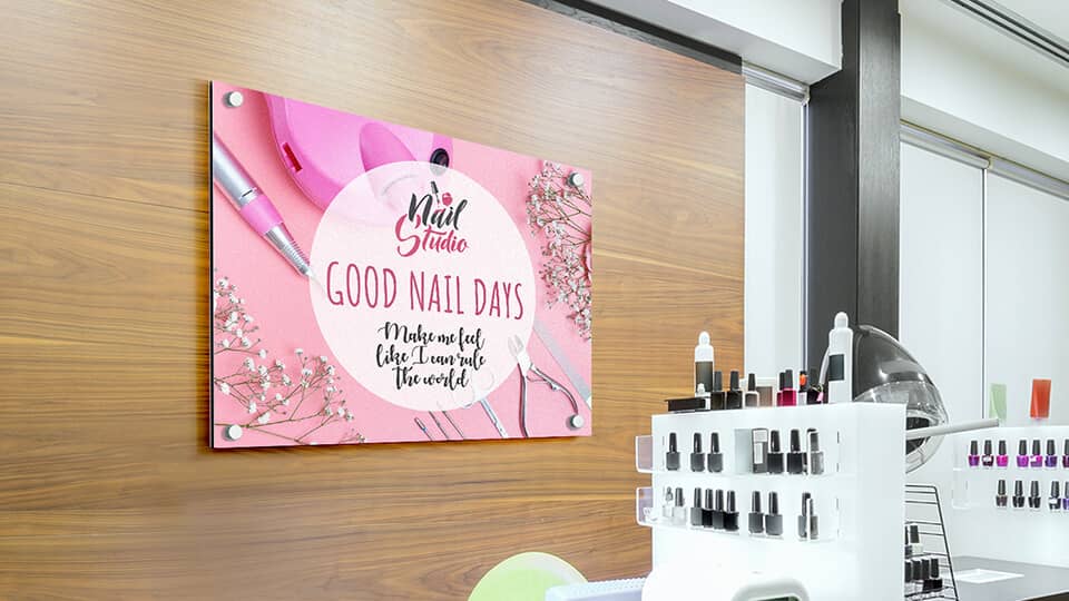 Wall-mounted composite aluminum signs installed in a beauty salon