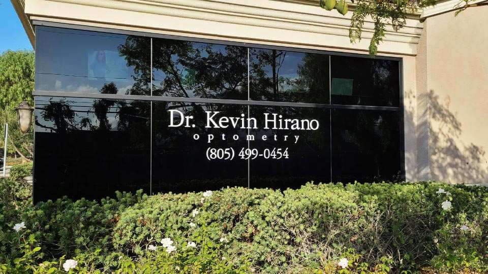 Dr. Kevin Hirano custom vinyl letters displaying the company's name and phone number