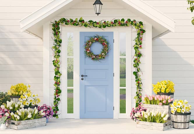 Idea to decorate front porch for Easter with flowers in pots