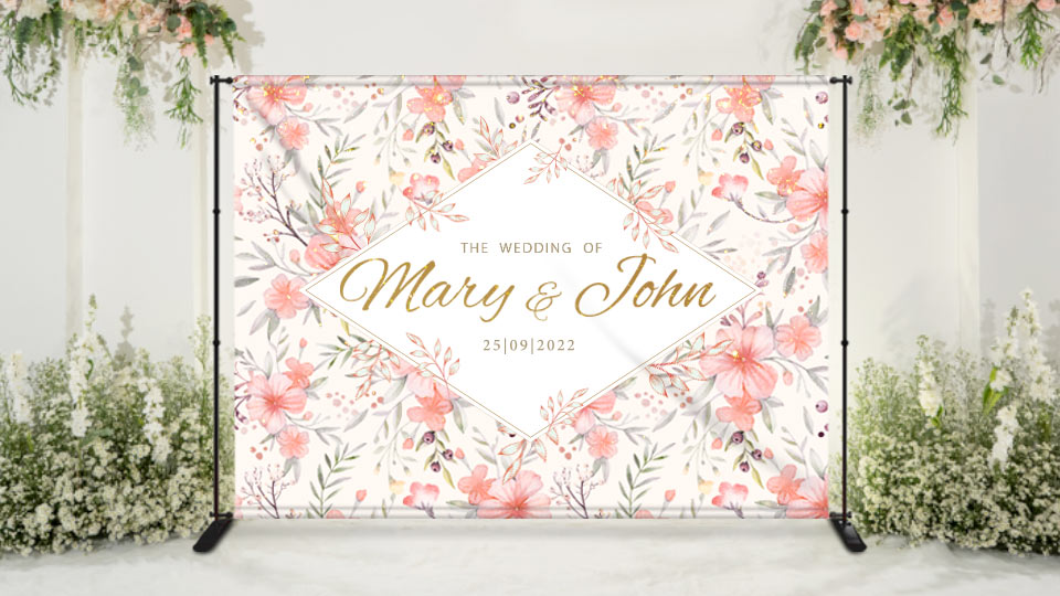 large wedding photo backdrop with floral graphics and personalized texts