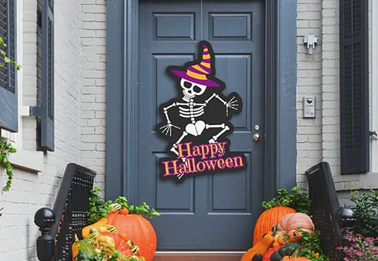 custom Happy Halloween cut-out door sign in a skeleton shape