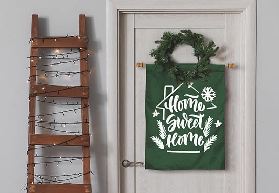 Interior home door banner with the wreath and writing 'Home, Sweet Home'
