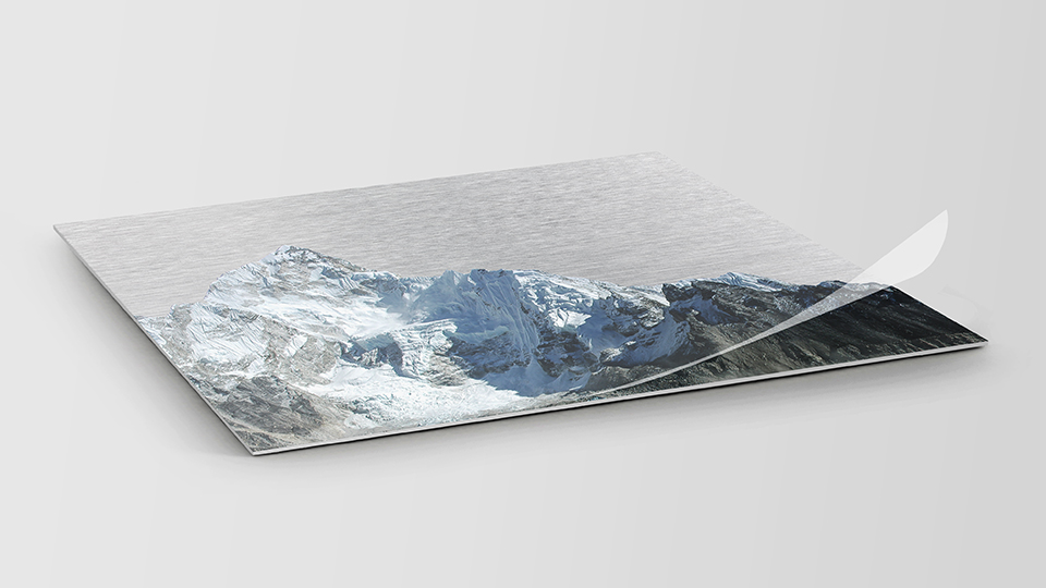 Brushed aluminum printing with mountain graphics covered with a lamination coating