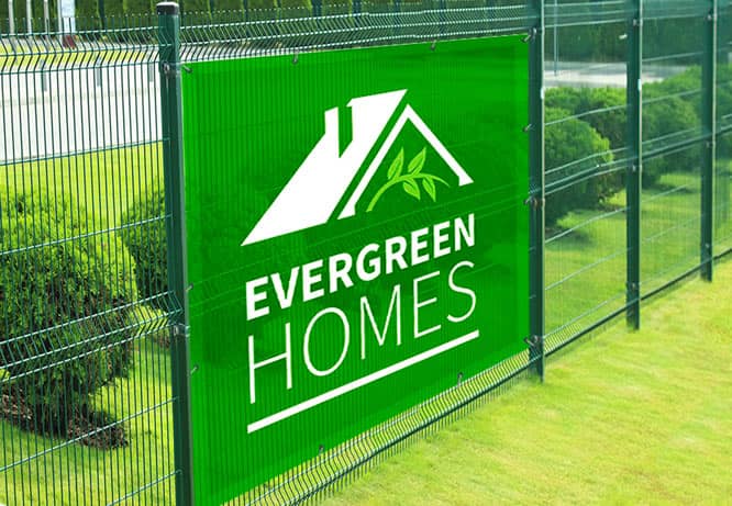 Green see-through mesh banner with a house logo print