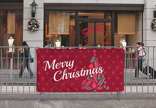 Holiday fence banner in front of the store