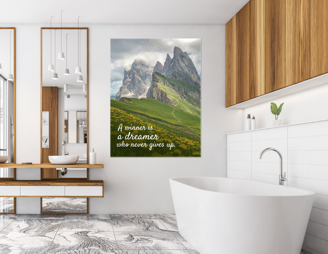 Nature themed motivational wall art with a quote and mountains scene in the bathroom