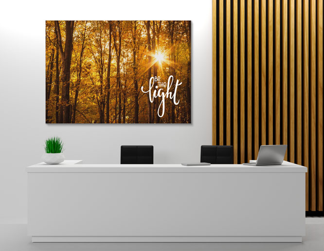 Nature-themed motivational wall art with fall forest scene for the office reception