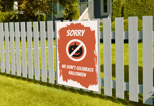 NO Halloween sign in red and white displayed on the fence
