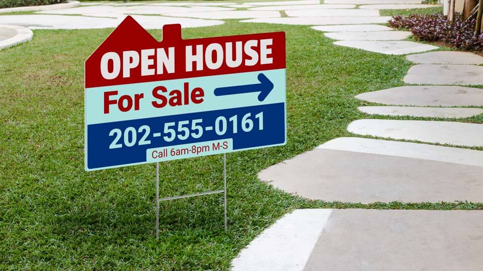 Custom-designed open house sign on the lawn