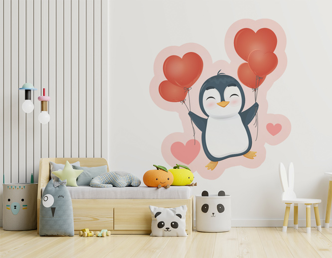 Custom cut nursery wall decal displaying a smiling penguin with heart balloons