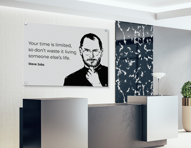 Black and white inspirational wall art with Steve Jobs' portrait and quote