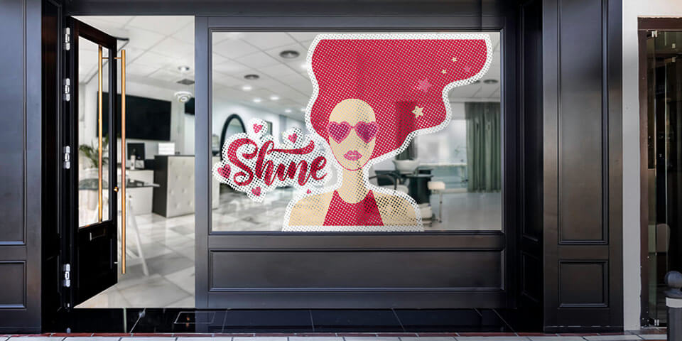 Custom-cut perforated window decal with pink visuals for beauty salons