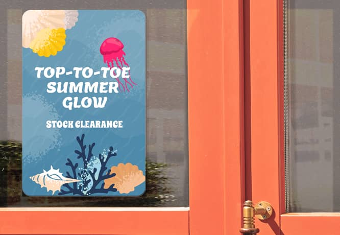 Summer clearance sale sign installed on a store window