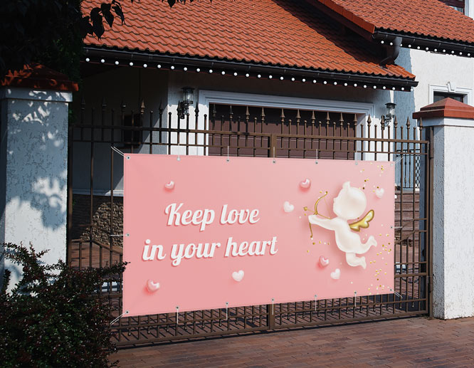  angel-themed Valentine's decoration idea displaying a love quote hung from the fence
