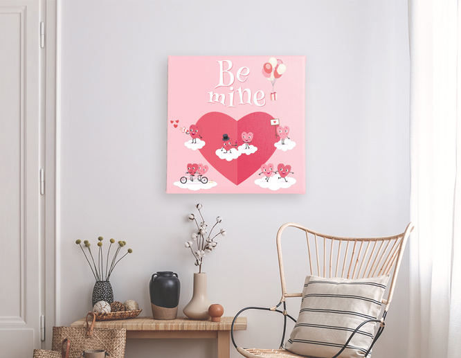 pink hued Valentine decoration idea displaying the text Be Mine on the wall
