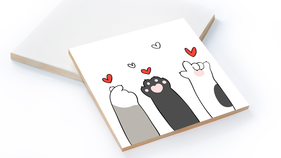 White coated wood print illustrating cat paws designed with heart icons