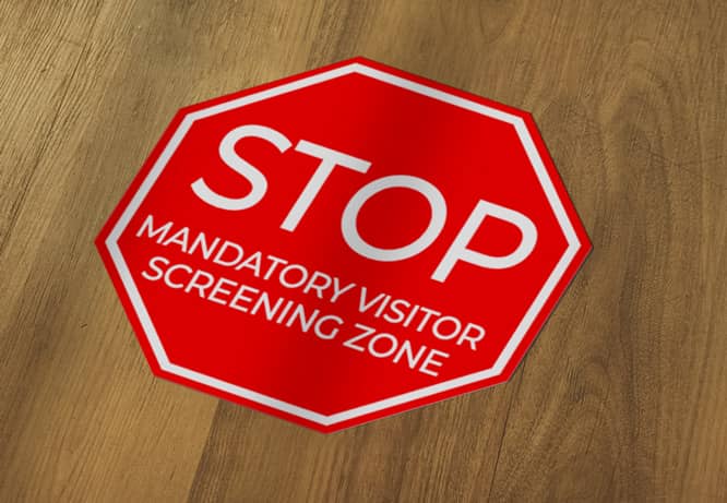 Workplace mandatory screening zone red sticker on the floor