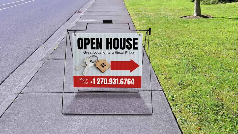 A-frame open house sign with a directional arrow.