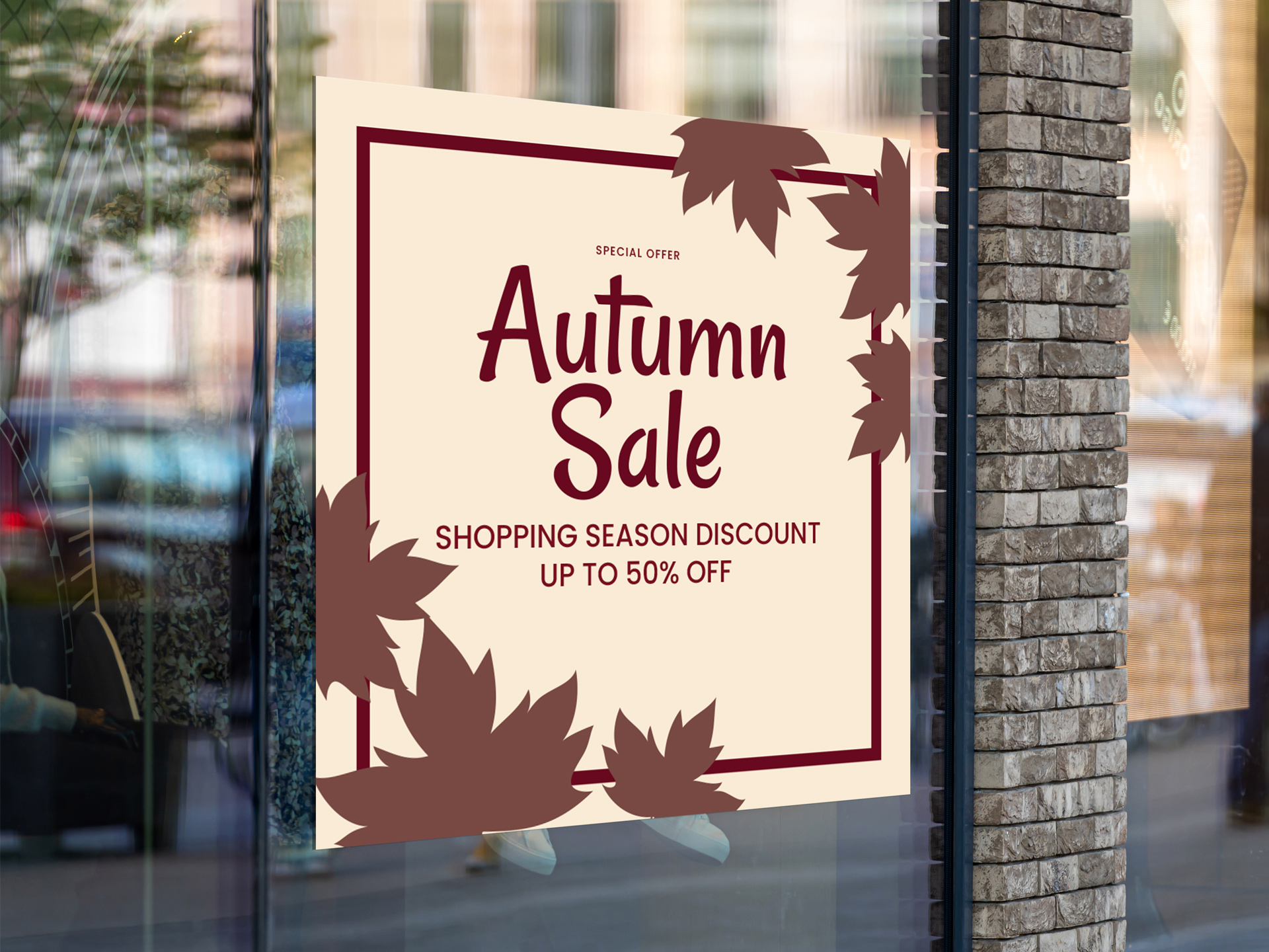 Autumn sale window decal promoting seasonal shopping discounts.