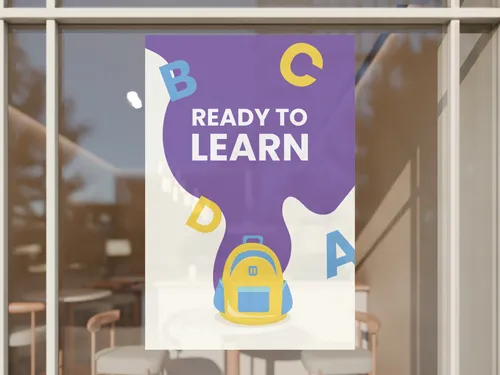 Colorful back to school sign featuring Ready to Learn text with letters and backpack.