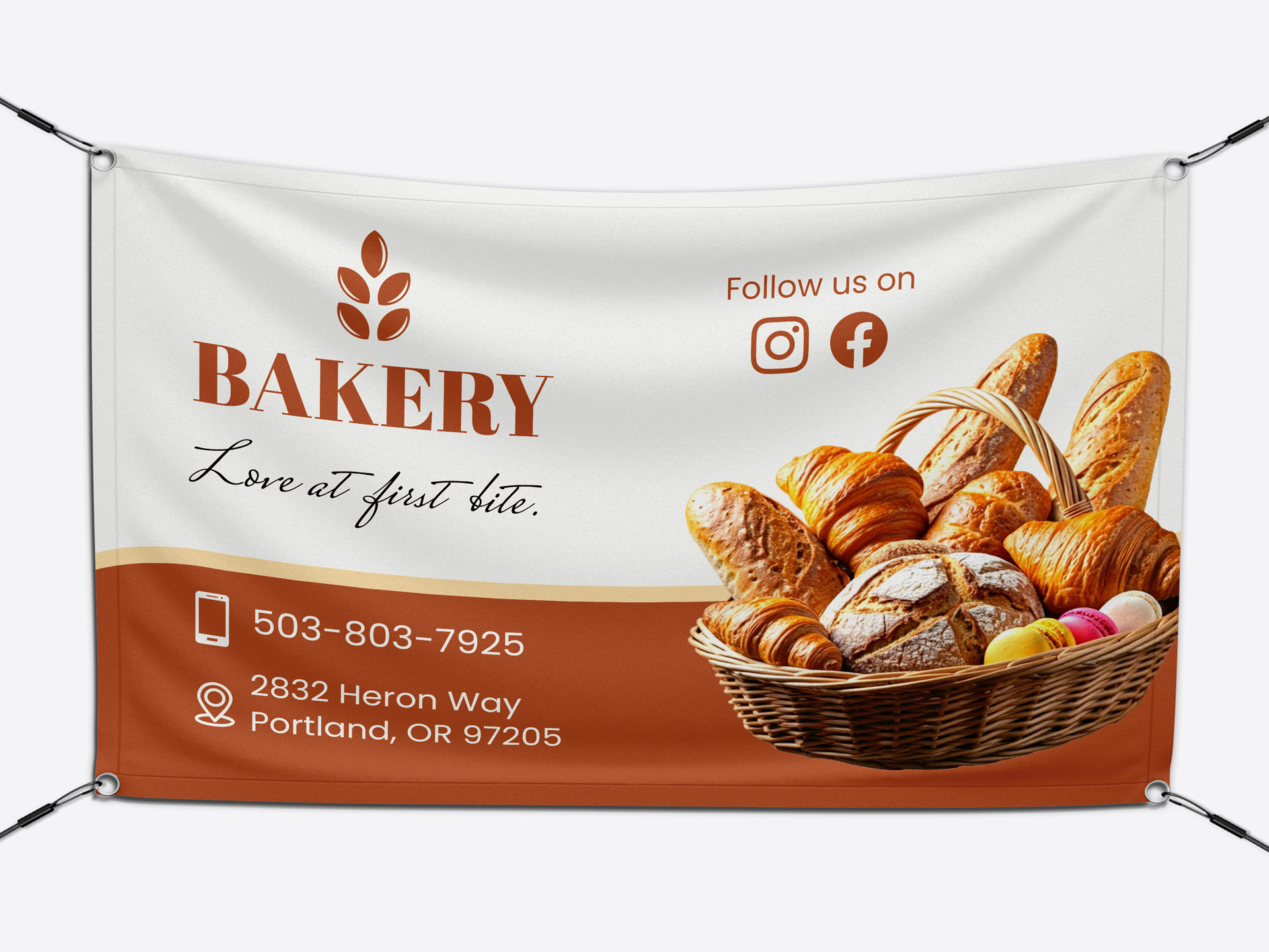 Bakery vinyl banner advertising fresh bread and pastries with contact details.