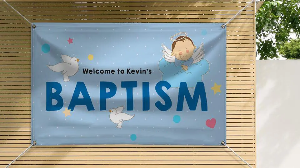 Blue festive Kevin's baptism party banner on the fence.