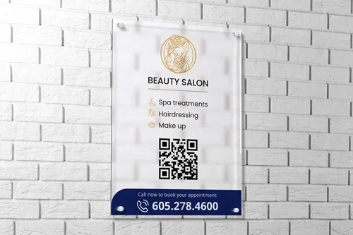 Advertising acrylic sign with standoffs for a beauty salon