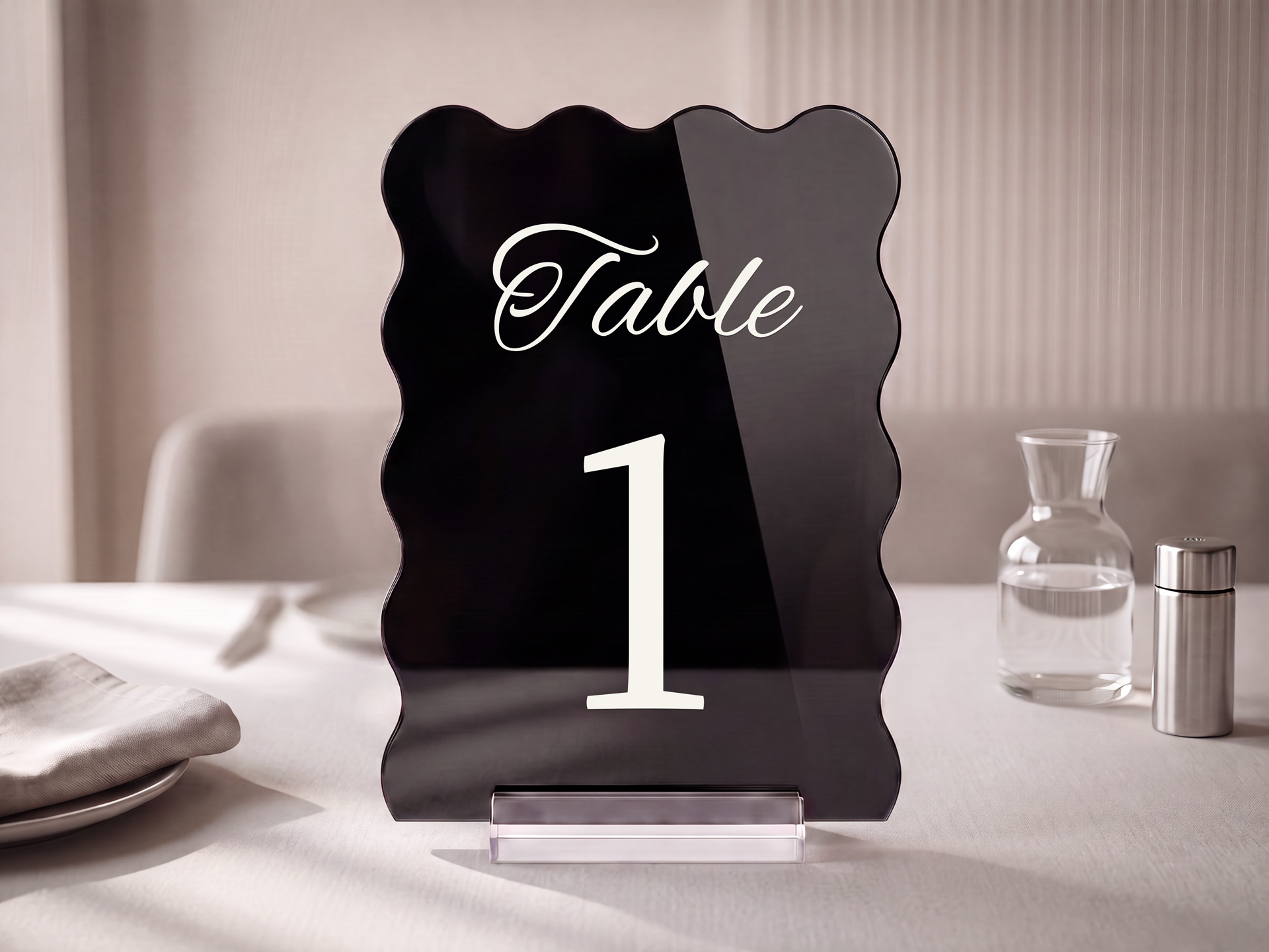 Black Acrylic table number displaying Table 1 on a restaurant table