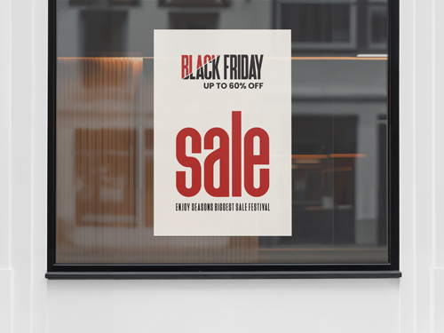 Black Friday window sign with large red 'sale' text, up to 60% off on white background.