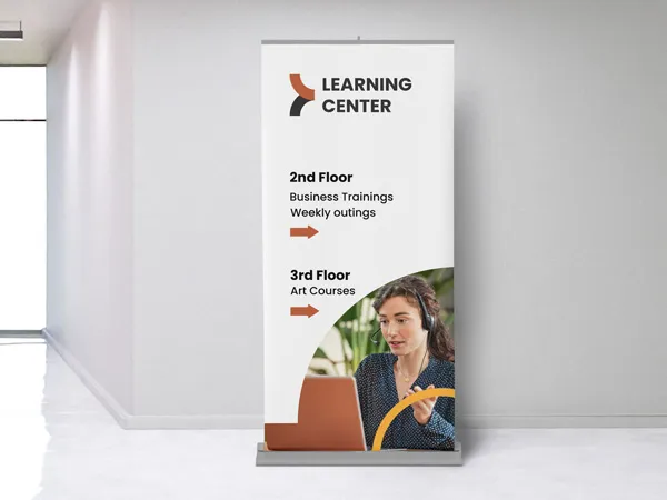 An educational center's custom retractable banner showing what courses are offered on each floor.