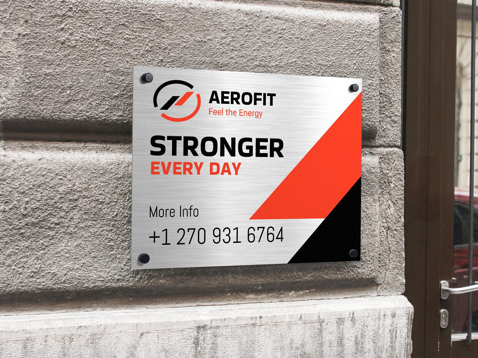 Outdoor brushed aluminum signage with company logo and contact information.