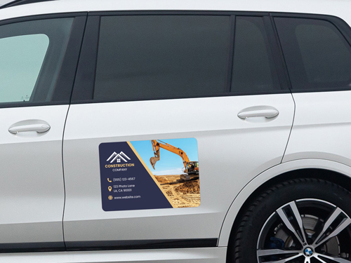 Informational car magnet advertising construction business services.