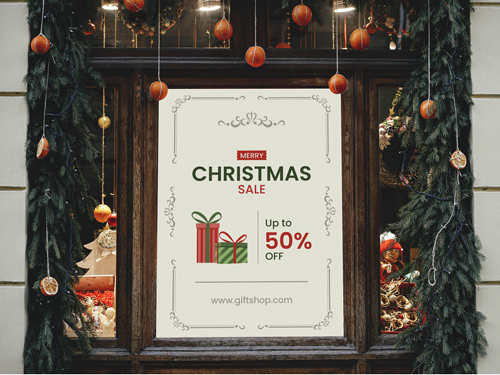 Festive Christmas sale window decal with gift illustrations and up to 50% off text on a decorated shop window.