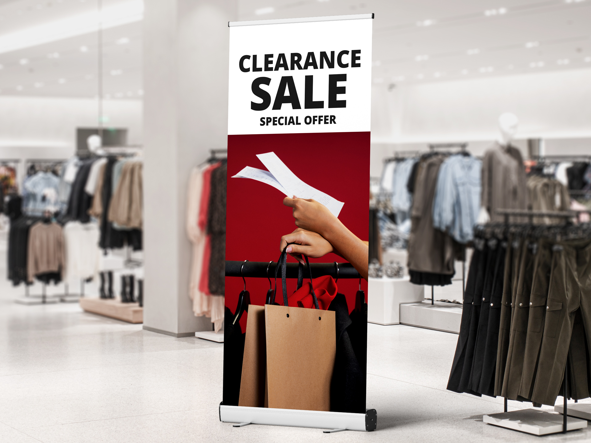 Clearance sale retractable banner inside retail store with special offer.