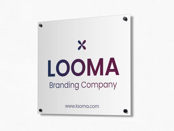 Looma Branding Company aluminum sign mounted on the wall with black standoffs.
