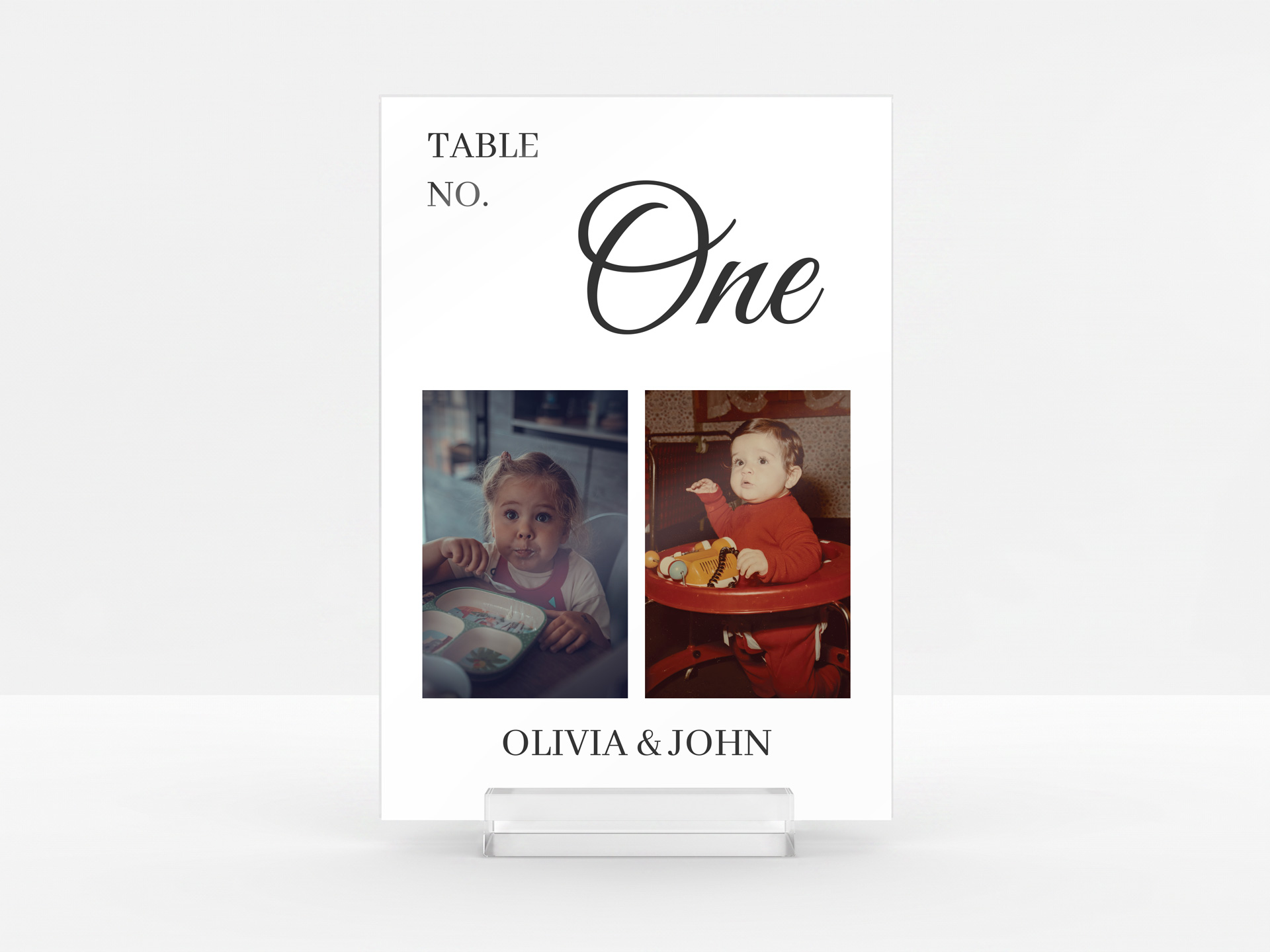 White acrylic table number featuring couple photos