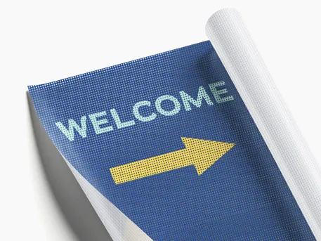 Custom banner for guiding visitors, made of mesh with yellow arrow on a blue background