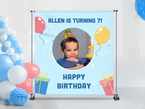 Custom banner for a child's birthday party featuring a portrait on a light blue background