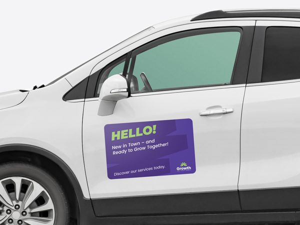 Custom car magnet applied to the side door of the car reading Hello.