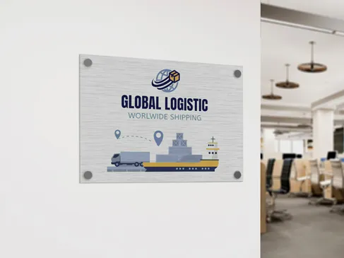 Brushed metal sign for global logistic installed on an office interior wall