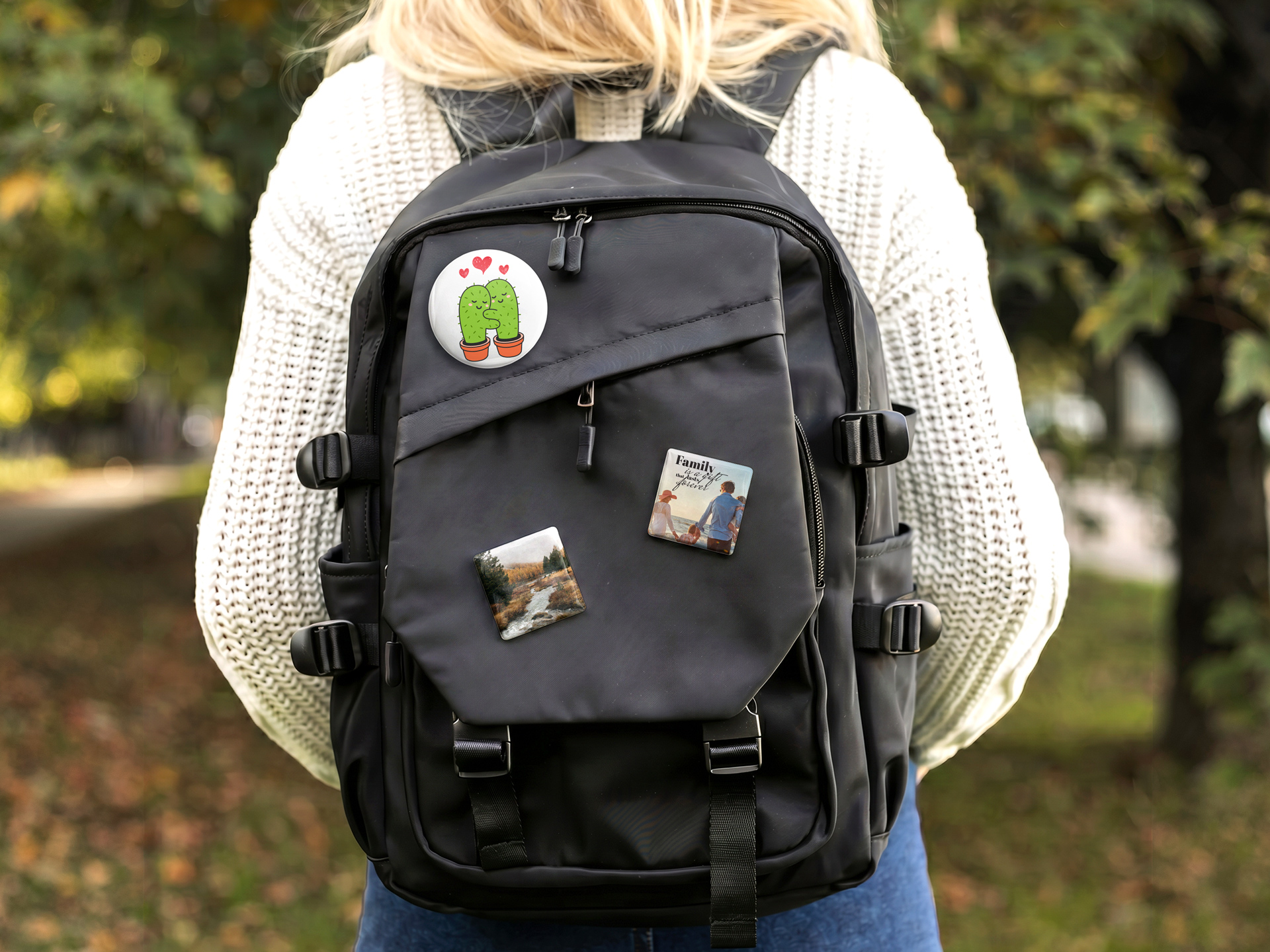 custom round and square photo buttons pinned to a black backpack