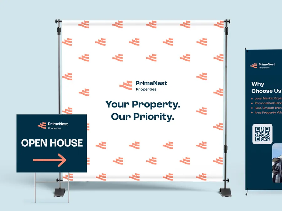 A collection of custom signs including a yard sign, retractable banner, and step and repeat banner.