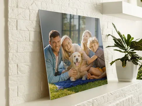 Decorative print of a family with their dog