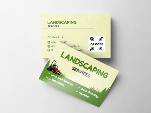 Green lawn care business cards with services and information on how to get in touch with