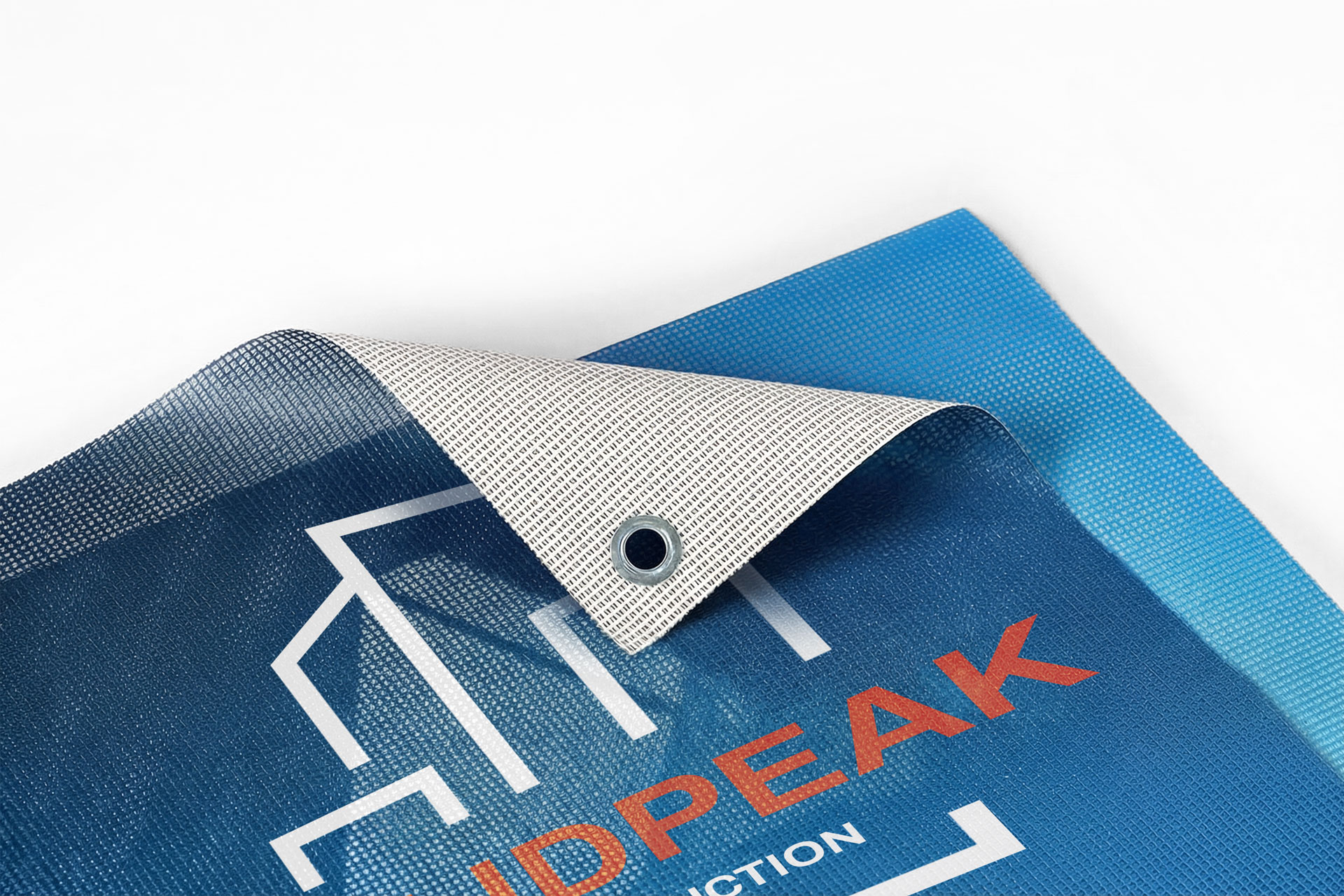 A close up of a blue folded mesh banner with logo